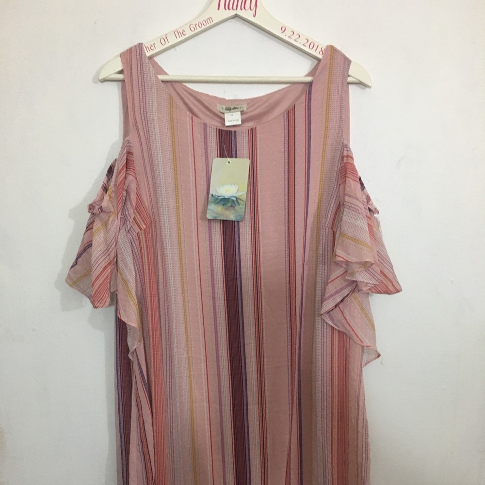 Plus size dress cold shoulder style bo ho style.